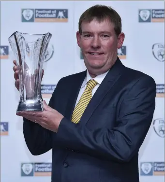  ??  ?? Sean O’Keeffe from Asdee Rovers with his John Sherlock award for services to football at the FAI Communicat­ions Awards & Delegates Dinner at Hotel Kilkenny Photo by Matt Browne/Sportsfile