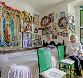  ?? FOTO JULIO CÉSAR HERRERA ?? Mariela Vergara está orgullosa de su colección de imágenes religiosas acumuladas en 40 años.