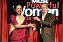  ??  ?? Sarah Vaidyan collecting the award on behalf of Alice G. Vaidyan, CMD, General Insurance Company