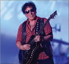  ?? PHOTO COURTESY OF KEN SETTLE ?? Neal Schon, performing with Journey during 2018 at Detroit’s Comerica Park, has released a new solo album, “Universe,” and is working on a new album with the band as well.