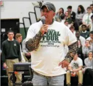 ?? COURTESY LISA RESETAR ?? Lake Catholic coach Rich Severino addresses a pep rally ahead of the Cougars’ state semifinal volleyball match in November in Fairborn.