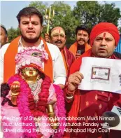  ?? President of Shri Krishna Janmabhoom­i Mukti Nirman Trust, Mathura, Bhriguvans­hi Ashutosh Pandey with others during the hearing in Allahabad High Court ??