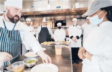  ?? KIERAN KESNER/THE NEW YORK TIMES ?? Students in the culinary program at Northern Essex Community College in Haverhill, Massachuse­tts.