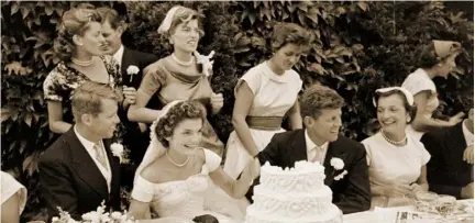 ??  ?? Bobby Kennedy, Jacqueline and John F Kennedy, and Lee at the wedding in 1953 of JFK and Jackie