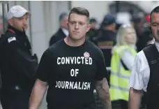  ?? Getty ?? Founder and former leader of the English Defence League Tommy Robinson arrives at the Old Bailey on Thursday