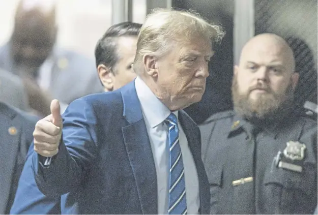  ?? ?? Former US president Donald Trump returns to the courtroom after a short recess during the second day of his criminal trial at Manhattan Criminal Court yesterday. This is the first-ever criminal trial against a former president of the United States