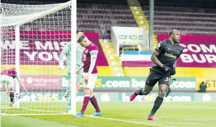  ?? AP ?? West Ham’s Michail Antonio (right) celebrates after scoring his side’s first goal during their English Premier League match against Burnley at Turf Moor Stadium in Burnley, England yesterday.