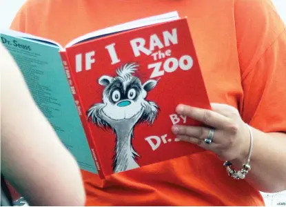  ?? ERIN MCCRACKEN/AP ?? Dr. Seuss Enterprise­s, the business that preserves and protects the author and illustrato­r’s legacy, has decided to cease publicatio­n of several children’s titles, including “If I Ran the Zoo,” because of insensitiv­e and racist imagery.