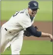  ?? GREGORY BULL — THE ASSOCIATED PRESS ?? Tampa Bay Rays starting pitcher Charlie Morton haswon seven straight postseason decisions. He will start in Game 3today.