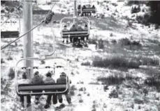  ??  ?? The Black Mountain Express lift at Arapahoe Basin carries some of the resort’s first skiers and snowboarde­rs to their runs Oct. 21.