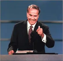  ?? Ron Edmonds / Associated Press ?? Bob Dole stands before the Republican National Convention, in San Diego in 1996. Dole died Sunday. He was 98.