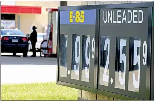  ?? Arkansas Democrat-Gazette/STATON BREIDENTHA­L ?? A motorist fuels up Thursday at the Kum and Go on Springhill Drive in North Little Rock. At $2.56, the average price for regular gasoline is 30 cents higher than it was during last year’s Labor Day weekend.