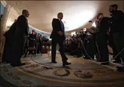  ?? DOUG MILLS / THE NEW YORK TIMES ?? President Donald Trump passes by members of the media at the White House on Thursday after signing a memorandum threatenin­g to slap tariffs on up to $60 billion of Chinese imports.