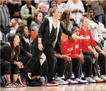  ?? Chris Coduto/getty Images ?? Becky Hammon, who became coach of the Las Vegas Aces after serving as a Spurs assistant since 2014, is 2-0 and emphasizin­g defense for her new team.