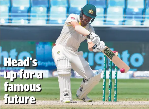  ?? Picture: GIUSEPPE CACACE/AFP ?? Travis Head plays a shot during the fifth day of play between Australia and Pakistan