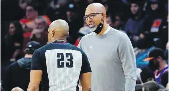  ?? THE ASSOCIATED PRESS ?? Phoenix Suns head coach Monty Williams, right, argues a call during an NBA basketball game this month. Williams is one of four NBA coaches sidelined due to COVID-19 isolation.