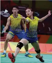  ??  ?? Chan Peng Soon-goh Liu Ying mara ke suku akhir saingan badminton Masters Thailand.