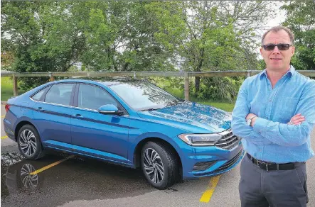  ?? PHOTOS: AL CHAREST ?? Richard Phillips says the redesigned 2019 Volkswagen Jetta Execline’s “new styling is much more distinctiv­e.”