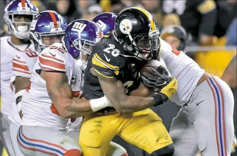  ?? Matt Freed/Post-Gazette ?? Running back Le'Veon Bell and the Steelers ground game could play a big role in the team’s fate in the final four games of the regular season.