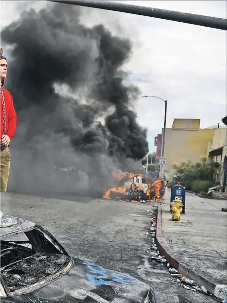  ?? Wally Skalij Los Angeles Times ?? est after George Floyd’s death. Large demonstrat­ions persisted for weeks, in core urban areas and wealthy enclaves alike across the U.S.