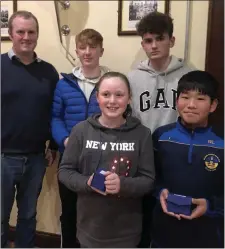  ??  ?? The winning Rosslare team with quizmaster Joe Cummins.