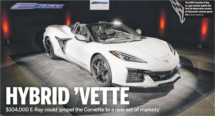  ?? CARLOS OSORIO/AP ?? The 2024 Corvette E-Ray is a gas-electric hybrid, the first all-wheel-drive version of Chevrolet’s storied sports car.