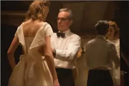  ?? LAURIE SPARHAM, FOCUS FEATURES ?? Vicky Krieps stars as Alma and Daniel Day-Lewis stars as Reynolds Woodcock in writer/director Paul Thomas Anderson’s "Phantom Thread," which Day-Lewis says is his last movie.