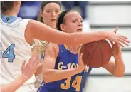  ?? MARK HOFFMAN / MILWAUKEE JOURNAL SENTINEL ?? Kenzie Schmitz (right) is scoring 20.9 points per game and is a big reason third-ranked Germantown is off to a 7-0 start.