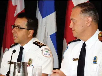  ??  ?? Les chefs des services de police de Gatineau et de Montréal, Mario Harel (à gauche) et Philippe Pichet, aimeraient être mieux outillés pour combattre les cybercrime­s.