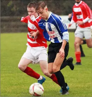  ??  ?? Evan Foley of Moyne Rangers and Danny Cranch of Gorey Rangers battle for possession.