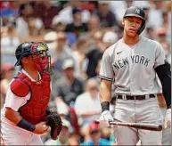  ?? Maddie Meyer / Getty Images ?? Aaron Judge of the Yankees reacts after striking out during the third inning against the Red Sox at Fenway Park in Boston on Sunday. Judge hit a two-run homer in the sixth and finished 1-for-4.