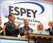  ??  ?? In this image from the Espey website, company President and CEO Mark St. Pierre is shown in the center.
