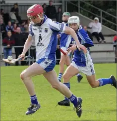  ??  ?? Aidan Kavanagh racing goalwards for Craanford.