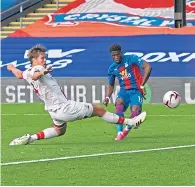  ??  ?? Wilfried Zaha fires in a shot at Selhurst Park