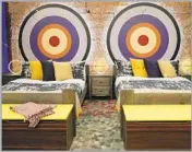  ??  ?? A FUN and eye-catching archery-themed bedroom contains colorful targets above the two double beds.