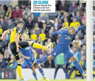  ??  ?? ZO CLOSE Zohore heads this chance over but had the last word