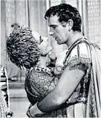  ??  ?? Serpenti devotee Elizabeth Taylor with Richard Burton in Cleopatra (1963). During filming in Rome she made plenty of trips to Bulgari’s Via dei Condotti boutique