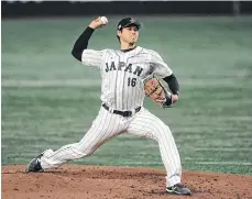  ?? /EFE. ?? En cuatro entradas sobre la lomita, el japonés Shohei Ohtani ponchó a cinco bateadores chinos.