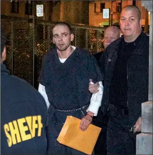  ?? Arkansas Democrat-Gazette/BENJAMIN KRAIN ?? Arron Lewis is led out of the Pulaski County Courthouse in shackles Wednesday after opening statements in his capital-murder and kidnapping trial in the 2014 slaying of real estate agent Beverly Carter.