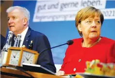  ??  ?? Merkel and head of Christian Social Union (CSU) Horst Seehofer attend a meeting of their conservati­ve bloc to discuss their election programme in Berlin. — Reuters photo