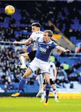  ??  ?? Bristol City’s Jamie Paterson challenges Birmingham’s Maikel Kieftenbel­d