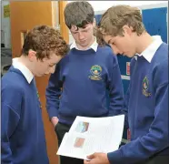  ??  ?? Pobalscoil Chorca Dhuibhne Junior Cert Students (from left) Neesan O’Brien-Ó Sé, Liam Ó Luinneachá­in and Ríoghán Herkommer looking over the Geography paper after Friday morning’s exam