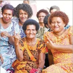  ?? Picture: BALJEET SINGH ?? Members of the Nasomo Landowners Trust after receiving their eighth mineral royalty fair share from Minister for Lands and Mineral Resources Jone Usamate at Nasomo Community Hall, Vatukoula in Tavua.