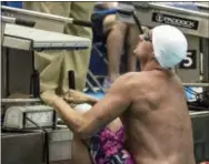  ?? RICHARD T. SLATTERY — NEWSDAY VIA AP ?? Ryan Lochte prepares to start in a preliminar­y of the men’s 100-meter backstroke at the U.S. Open swim meet in East Meadow, N.Y., Saturday. Lochte set the meet record in the finals of the 200 IM Sunday.