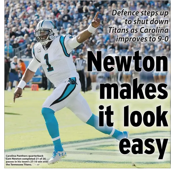  ?? — AP ?? Carolina Panthers quarterbac­k Cam Newton completed 21 of 26 passes in his team’s 27-10 win over the Tennessee Titans.