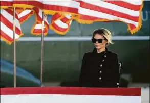  ?? Will Newton / For The Washington Post file photo ?? First lady Melania Trump looks on as President Donald Trump speaks at Joint Base Andrews in Suitland, Md., on Jan. 20, 2021.
