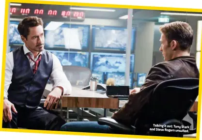  ??  ?? Talking it out: Tony Stark and Steve Rogers unsuited.