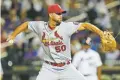  ?? FRANK FRANKLIN II/ASSOCIATED PRESS ?? The Cardinals’ Adam Wainwright delivers a pitch during the first inning of Monday’s game against the Mets in New York.