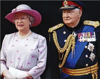  ??  ?? Side by side: The Queen with Lord Bramall at VJ Day celebratio­ns in London in 1995