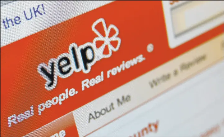  ?? Richard Vogel The Associated Press ?? The Yelp website is shown on a computer screen in Los Angeles. Last year, Yelp, which is based in San Francisco, removed more than 2,000 racist business reviews.